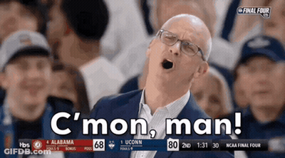 Man In Suit And Glasses Shouts C'mon Man GIF