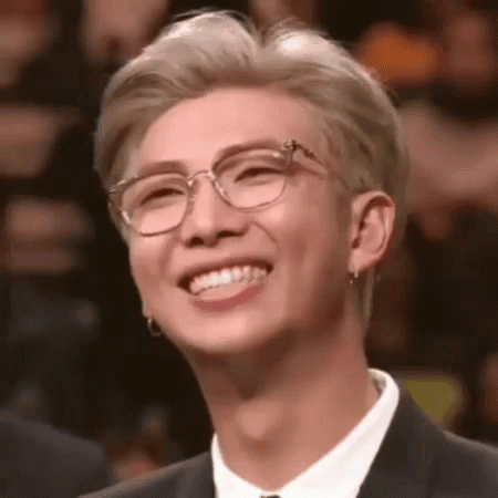 Man In Suit And Glasses Smiling GIF