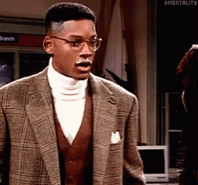 Man In Suit And Glasses Standing GIF