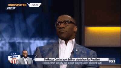 Man In Suit And Glasses Talking On Undisputed GIF