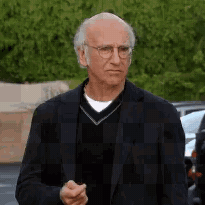 Man In Suit And Glasses Walking GIF