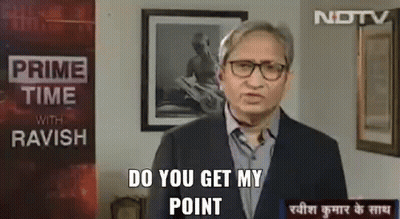 Man In Suit And Glasses With Prime Time With Ravin Sign GIF