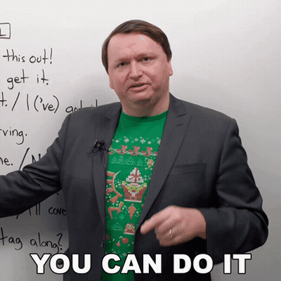 Man In Suit And Green Sweater Says You Can Do It GIF