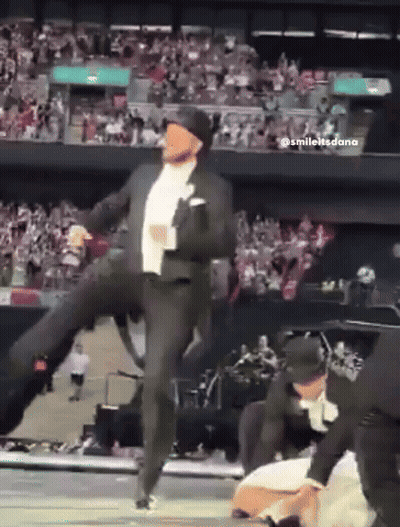 Man In Suit And Hat Dancing On Stage GIF