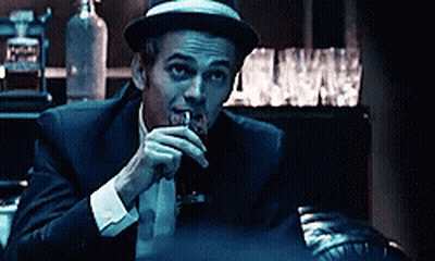 Man In Suit And Hat Drinking Whiskey GIF