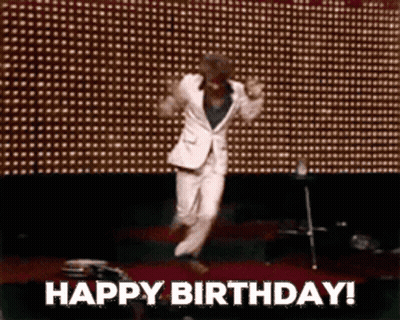 Man In Suit And Hat Jumping GIF