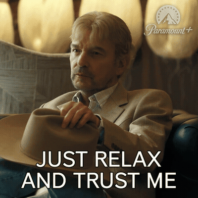 Man In Suit And Hat On Couch Saying Just Relax And Trust Me GIF