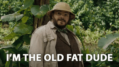 Man In Suit And Hat Says I'm The Old Fat Dude In Front Of Tree GIF