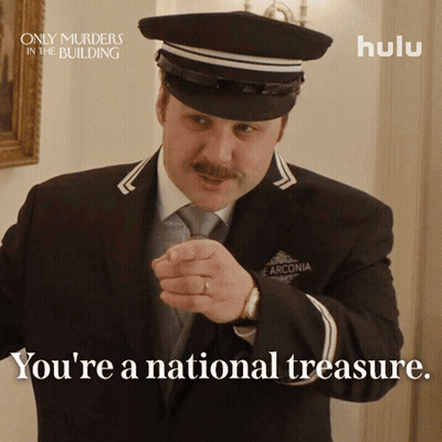 Man In Suit And Hat Says You're A National Treasure Hulu Ad GIF