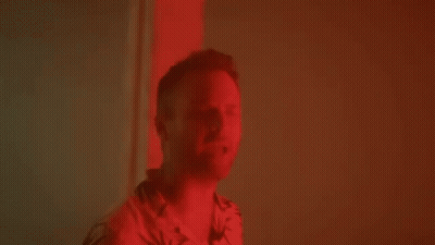 Man In Suit And Hat Talking About Making Friends On Movie Set GIF