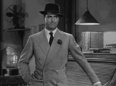 Man In Suit And Hat With Hand In Pocket GIF