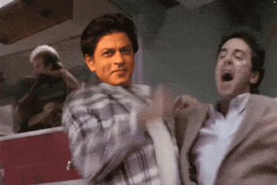 Man In Suit And Man In Plaid Shirt Dancing GIF