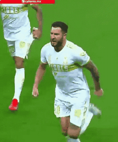 Man In Suit And Man In White Jersey 11 GIF