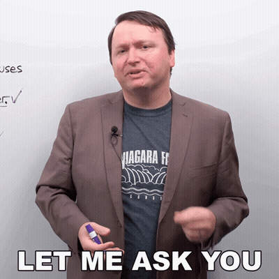 Man In Suit And Niagara T-Shirt Says Let Me Ask You GIF