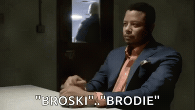 Man In Suit And Orange Shirt Saying Broski Brodie GIF
