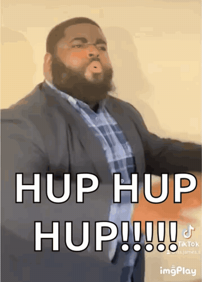 Man In Suit And Plaid Shirt Making Funny Face GIF