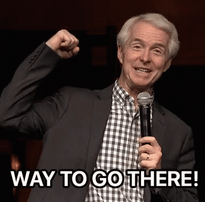 Man In Suit And Plaid Shirt Saying Way To Go GIF