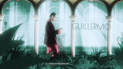 Man In Suit And Red Pants Before Guillermo Sign GIF