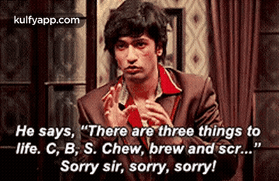 Man In Suit And Red Shirt Talking To Another Man GIF