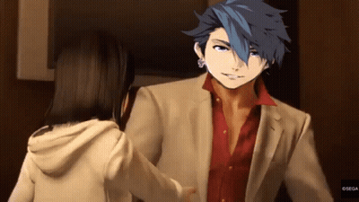 Man In Suit And Red Shirt Talking To Woman In Hoodie GIF