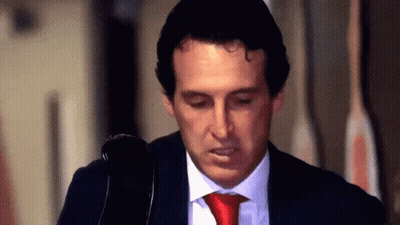 Man In Suit And Red Tie Looking Down GIF