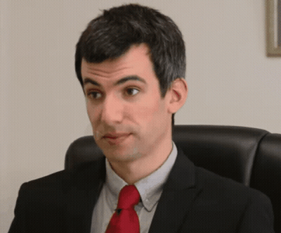 Man In Suit And Red Tie Making Funny Face GIF