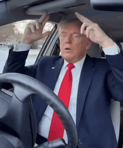 Man In Suit And Red Tie Sitting In Car GIF