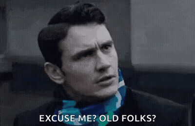 Man In Suit And Scarf Saying Excuse Me Old Folks GIF