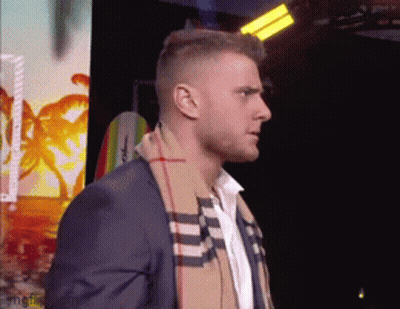 Man In Suit And Scarf GIF