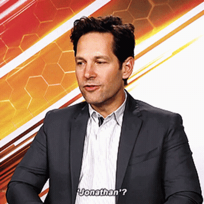 Man In Suit And Striped Shirt Says Jonathan's GIF