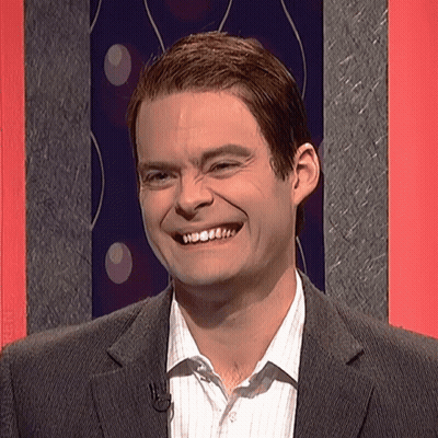 Man In Suit And Striped Shirt Smiling With Microphone GIF