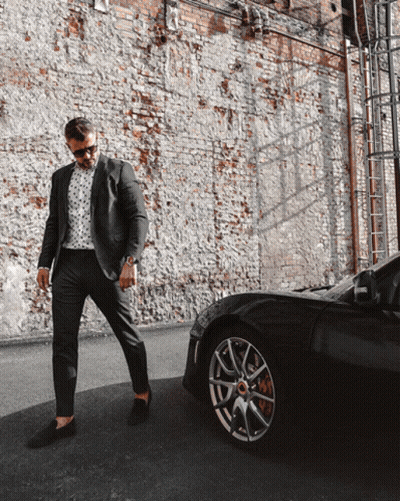 Man In Suit And Sunglasses Beside Black Car GIF