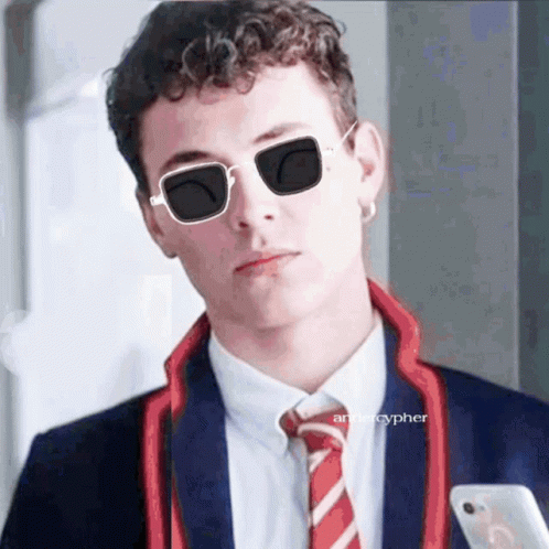 Man In Suit And Sunglasses Holding Cell Phone GIF