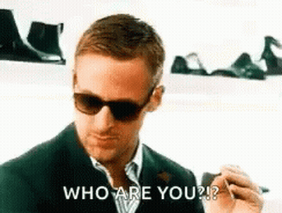 Man In Suit And Sunglasses Smoking GIF