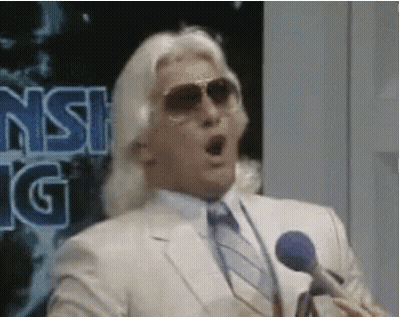 Man In Suit And Sunglasses Speaking GIF