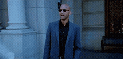Man In Suit And Sunglasses Standing GIF