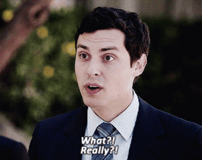 Man In Suit And Tie Asking What Really GIF