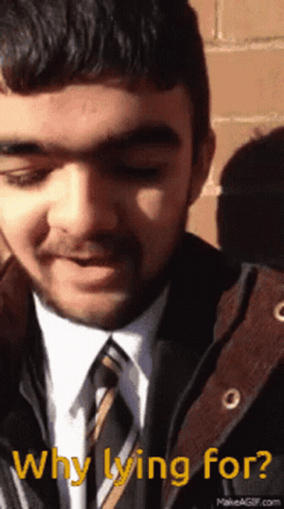 Man In Suit And Tie Asking Why He Is Lying For GIF