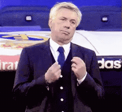 Man In Suit And Tie At Adidas Sign GIF