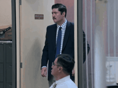 Man In Suit And Tie At Attorney General Door GIF