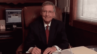 Man In Suit And Tie At Computer GIF