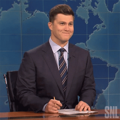 Man In Suit And Tie At Desk GIF