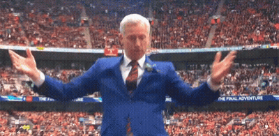 Man In Suit And Tie At Final Adventure Stadium GIF