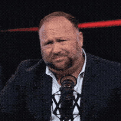 Man In Suit And Tie At M Microphone GIF