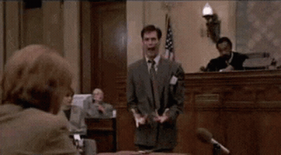 Man In Suit And Tie At Microphone GIF