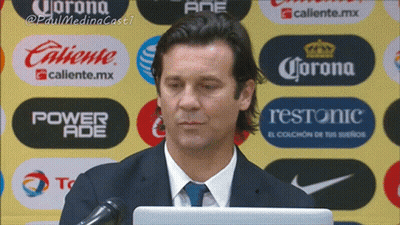 Man In Suit And Tie At Microphone GIF