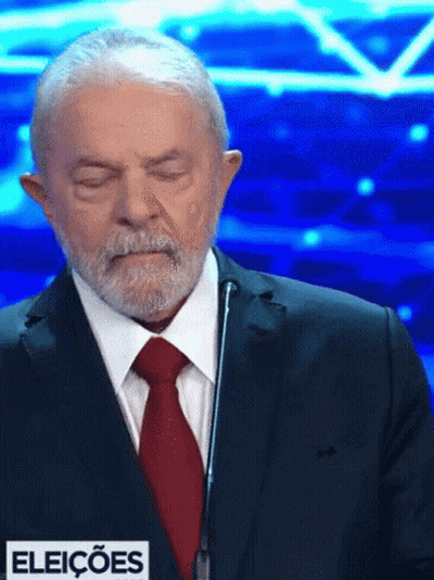 Man In Suit And Tie At Microphone Eleições GIF