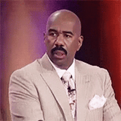 Man In Suit And Tie At Microphone GIF