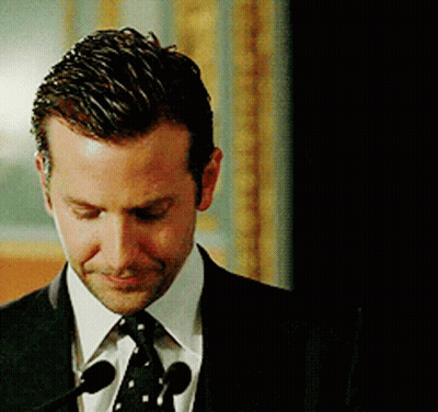 Man In Suit And Tie At Microphone GIF