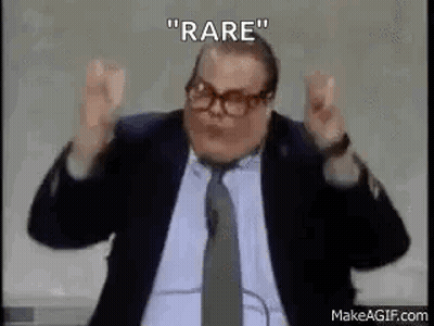 Man In Suit And Tie At Microphone GIF